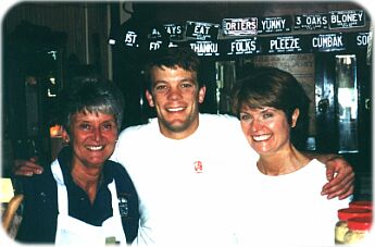 Caroline Drier (left) and her nephew, David Wooley, take pleasure in serving you only the finest in smoked meats, cured in their own 100 year-old smoke house!